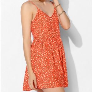 KIMCHI BLUE. ORANGE ROMPER.